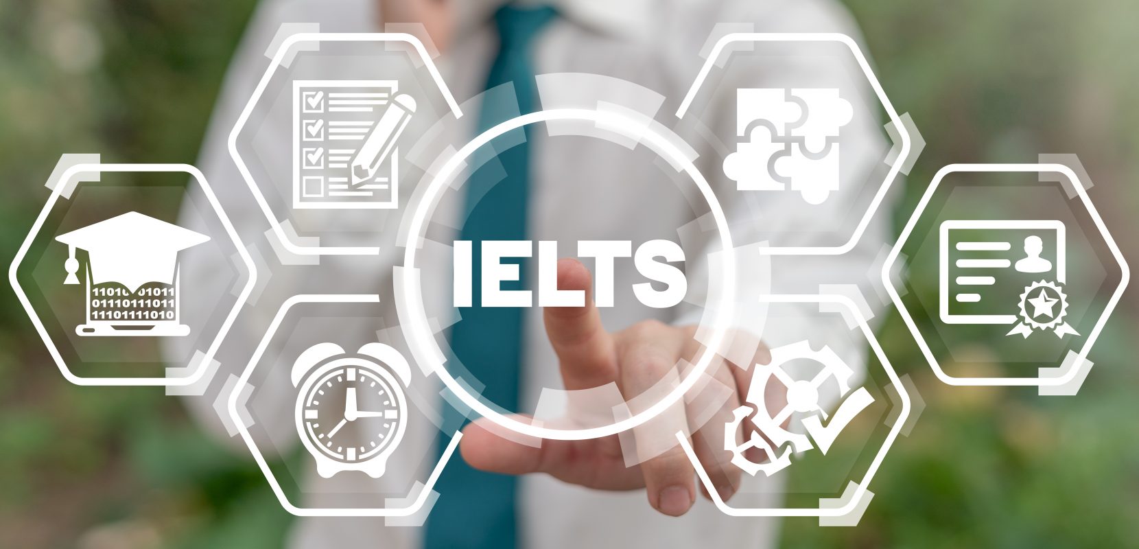 Man touches ielts acronym on virtual screen. IELTS International English Language Testing System. English test exam education concept.